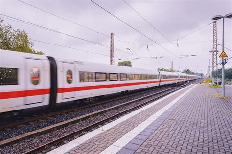 Premium Photo A Modern High Speed Intercity Train Carries Passengers