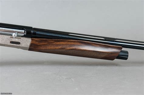 Benelli Ethos Nickle Engraved 28ga 26 Barrel Shotgun