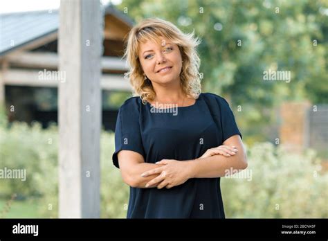 Outdoor Portrait Of Positive Successful Mature Middle Aged Woman Stock Photo Alamy