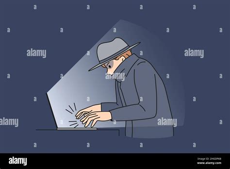 Online Crime And Fraud Concept Young Man Fraud Thief Sitting At Laptop