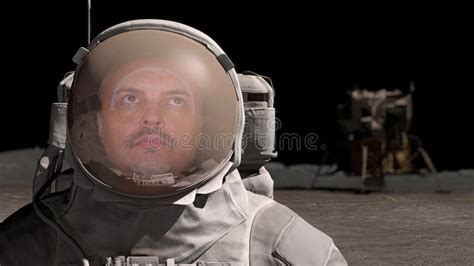 Portrait Of Man Astronaut In Outer Space Wearing Helmet Looking At