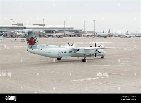 Air Canada Express Bombardier Q400 Turboprop Aircraft On Tarmac At