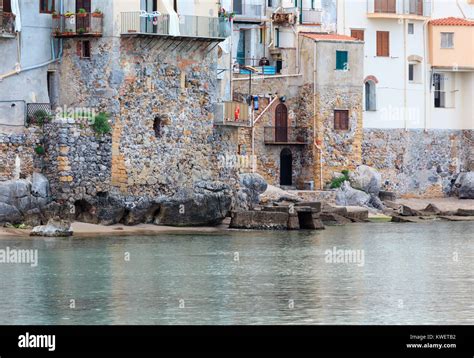 Cefalu old beautiful town houses above beach view, Palermo region, Sicily, Italy Stock Photo - Alamy