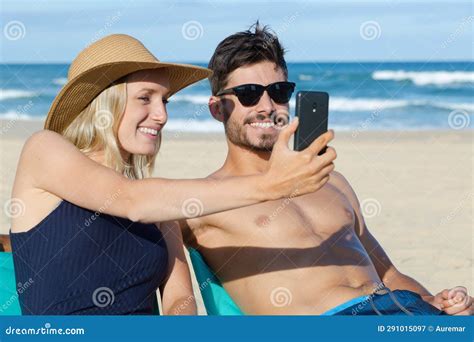 Couple On Beach Taking Selfie Stock Image Image Of Happy Handsome