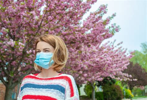 Allergy. Woman Wearing Protect Mask from Pollen Allergy Stock Image ...