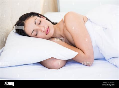 Pretty Brunette Sleeping On Bed Stock Photo Alamy