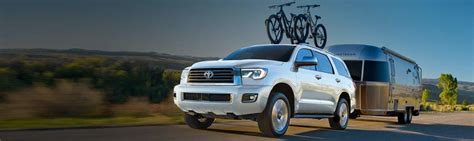 2021 Toyota Sequoia With A Bikes On Top And Pulling A Trailer