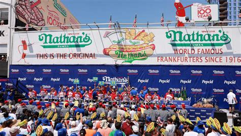 Joey Chestnut eats 62 hot dogs for 16th Nathan’s hot dog eating contest title