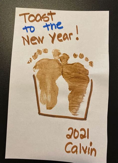 Creative New Years Craft Toast Footprint Art