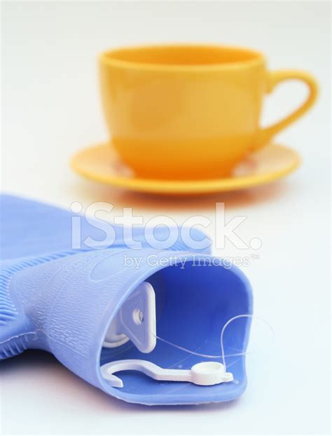 Cup And Hot Water Bottle Stock Photo Royalty Free FreeImages