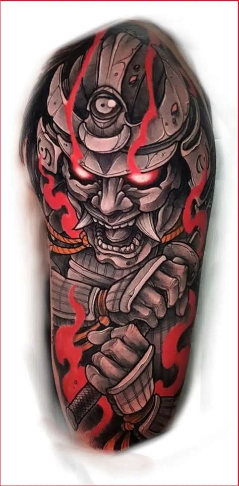 A Man With A Tattoo On His Arm Holding A Knife And Wearing A Helmet