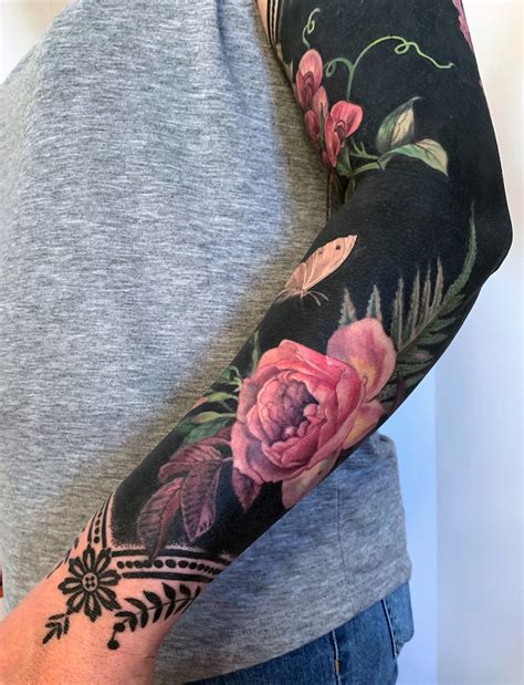 Brilliant Coverup Tattoos Combine Blackout Ink With Blossoms