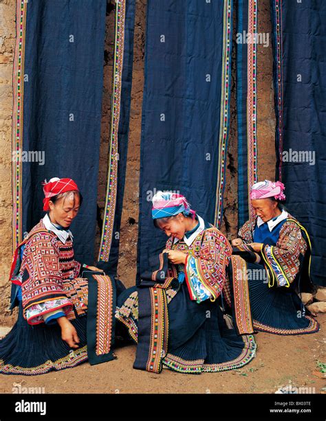 Su Miao Women Embroidering In Front Of Batik Clothing Dabatun Machang