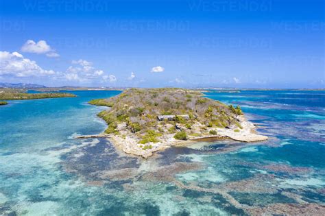 Aerial view by drone of coral reef in the turquoise water of Caribbean ...