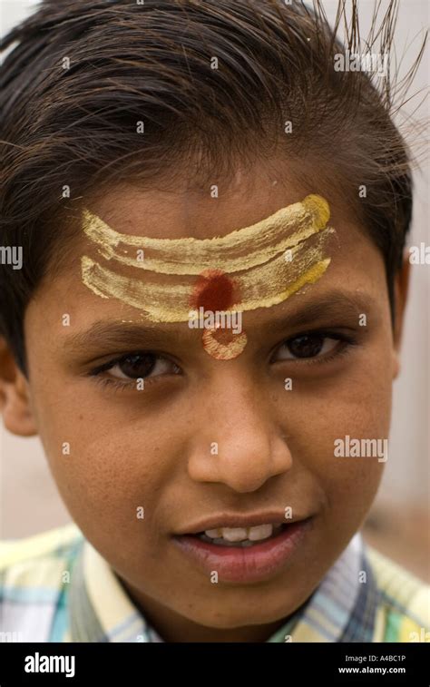 Stock Image Of A Young Hindu Boy With Religious Markings On His Face