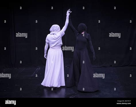 Female Members Of The Khishtan Performance Group Perform In A Play To