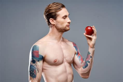 Premium Photo Tattooed Man Naked Torso Muscled Muscles Sport Fitness Apple Health