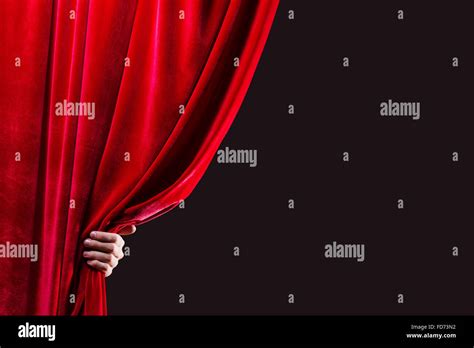 Close Up Of Hand Opening Red Curtain Place For Text Stock Photo Alamy