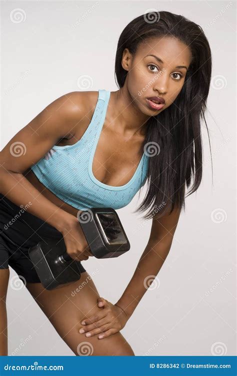 Working out with weights stock photo. Image of tracksuit - 8286342