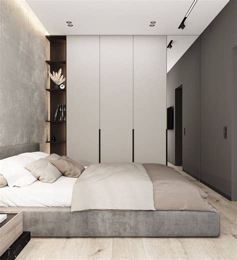 A Large Bed Sitting Under A Window Next To A Wall Mounted Book Shelf In