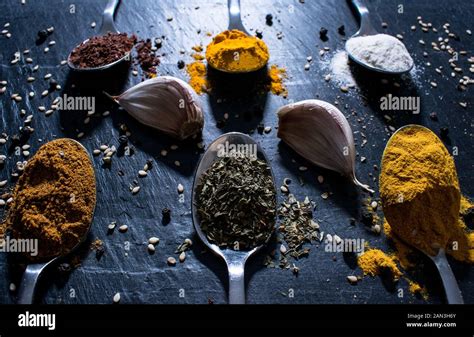 A Lot Of Spices With Black Background Stock Photo Alamy