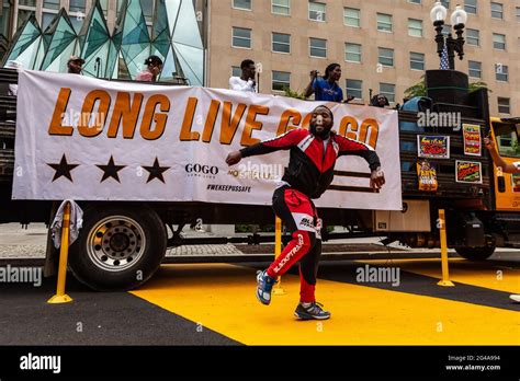 Mekhi Thomas Dances To The Sounds Of A Gogo Band Playing On The Long