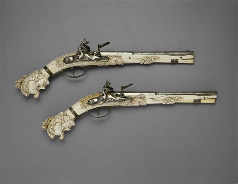 Pair Of Flintlock Pistols Steel Silver Ivory Ebony Leather And