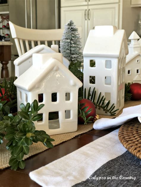 Christmas Table With White Ceramic Village Calypso In The Country