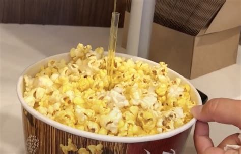 TikTok Hack Solves How to Evenly Butter Your Movie Theater Popcorn ...