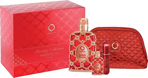 Estuche Orientica Amber Rouge Edp Uni 3 Pzs Bolso Beverly Hills Sa