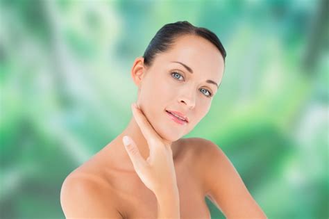 Premium Photo Beautiful Nude Brunette Posing With Hand On Face