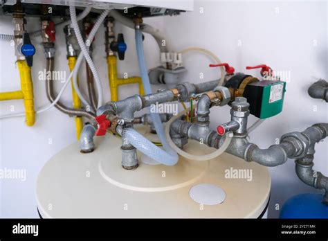 Installation Of Hot Water And Gas In A Home With Water Tank And Pipes Stock Photo Alamy