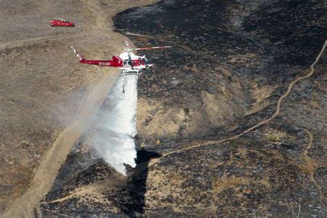 Firefighters Mop Up After San Juan Capistrano Brush Fire That