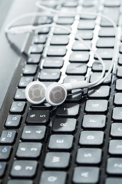 Premium Photo Laptop With Headphones