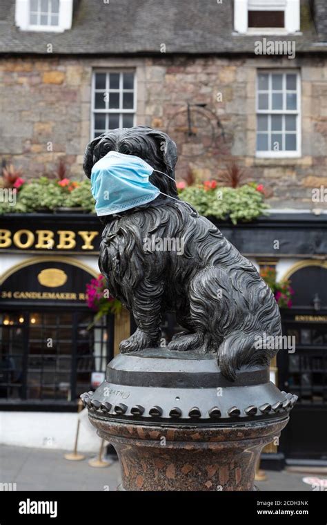 Covid 19 Uk The Statue Of Greyfriars Bobby With A Facemask On During