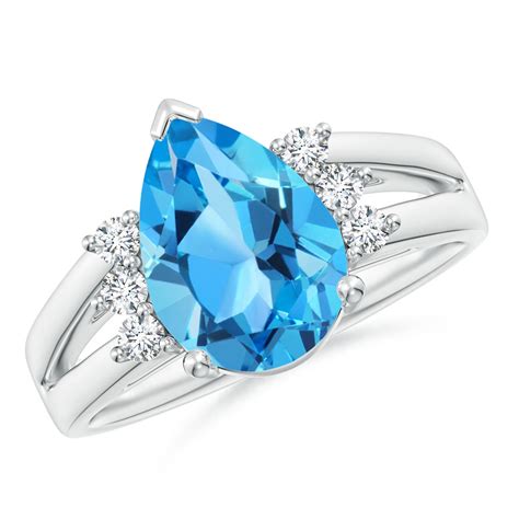 Pear Swiss Blue Topaz Ring With Triple Diamond Accents Angara UK