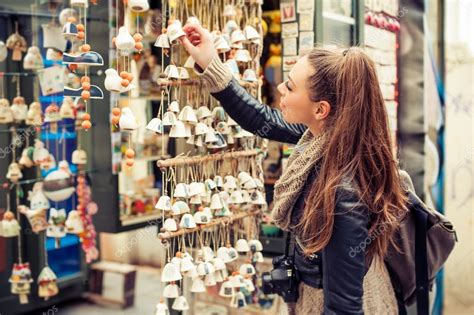 Woman Buying Souvenirs Stock Photo By ©guruxox 102319266