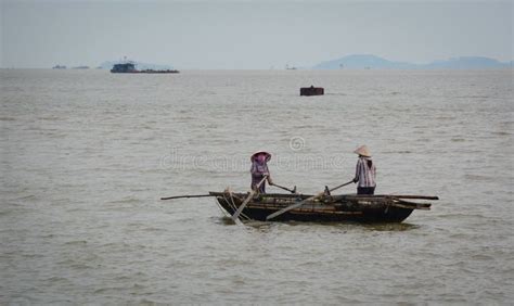 Vietnamese Women Rowing Wooden Boat Editorial Image Image Of Busy