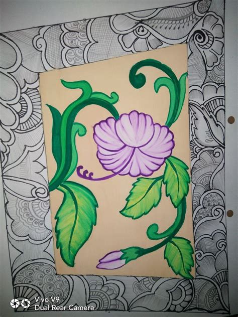 a drawing of a flower with green leaves and purple flowers on it's side