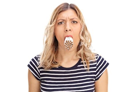 Woman With A Bunch Of Cigarettes In Her Mouth Stock Image Image Of