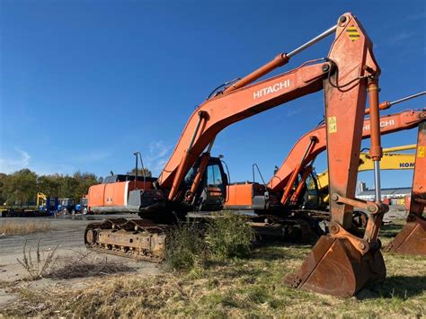 Купить б/у Hitachi ZX330 в Домодедово: оранжевый гусеничный экскаватор ...