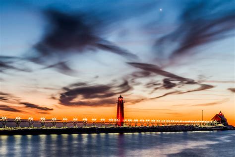 Grand Haven Lighthouse Light Show Photograph by Joe Holley - Fine Art ...