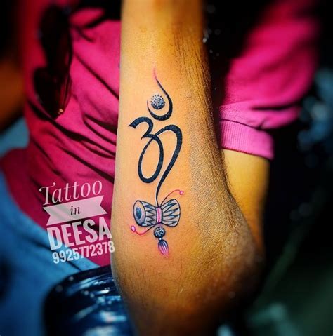 Om With Shiv Damru Tattoo On Hand Tattoos Hand Tattoos Infinity Tattoo