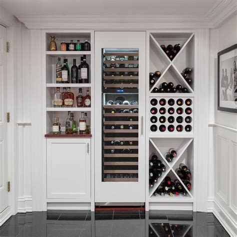 Basement With Built In Wine Racks And White Cabinets Finished With