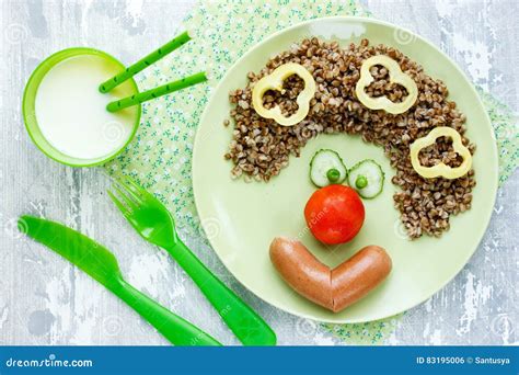 Healthy Buckwheat Funny Clown Face From Boiled Buckwheat With Stock