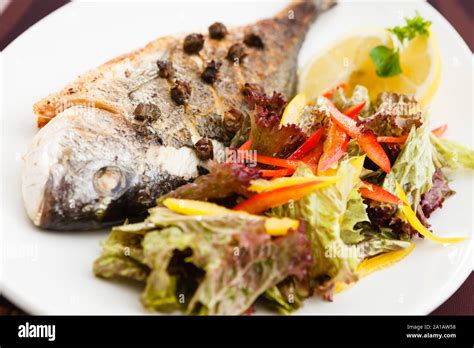 Grilled Gilt Head Bream Fish Stock Photo Alamy