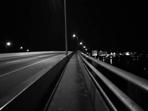 Premium Photo Illuminated Road In City At Night