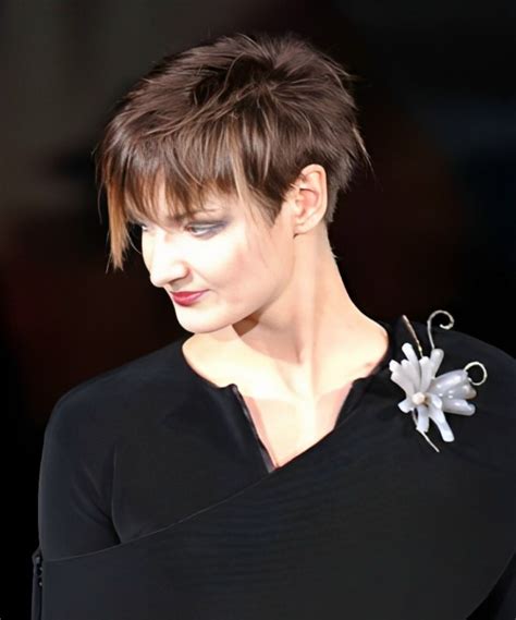 Gamine Short Haircut With The Hair Cut In A Wedge Around The Ear