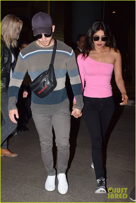 Nick Jonas Holds Hands With Priyanka Chopra As They Arrive In Mumbai