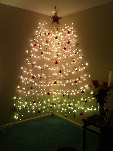 My Friends Christmas Tree String Lights From Wall To Wall In A Corner Using Command Strips So